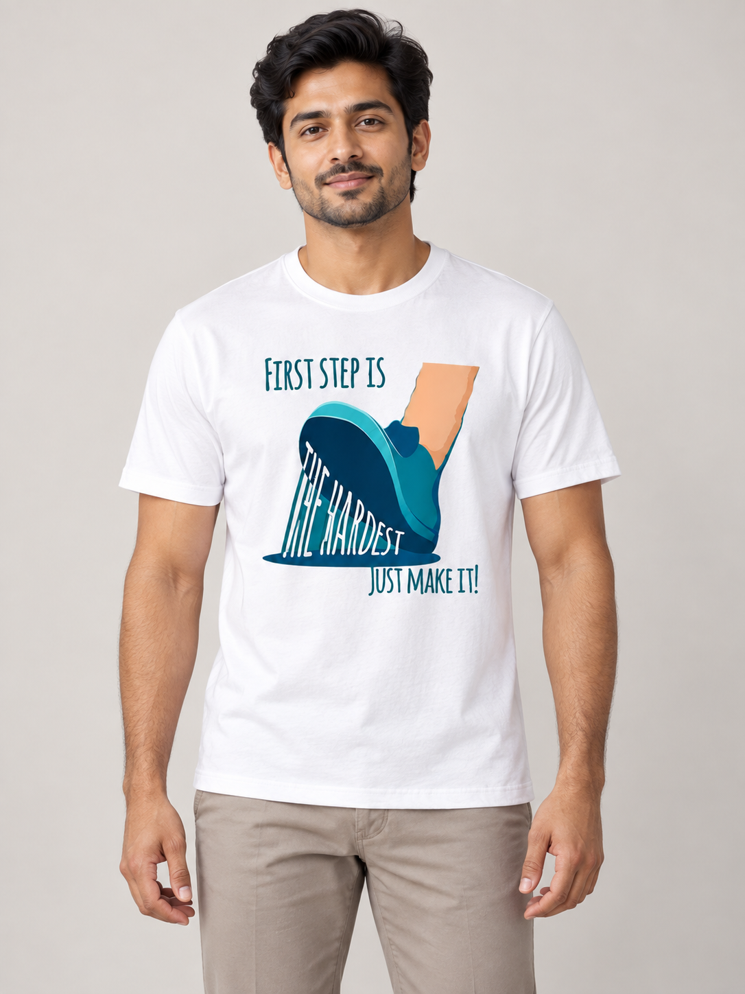Male model wearing First Step Is the Hardest white regular-fit printed T-shirt in an office setting