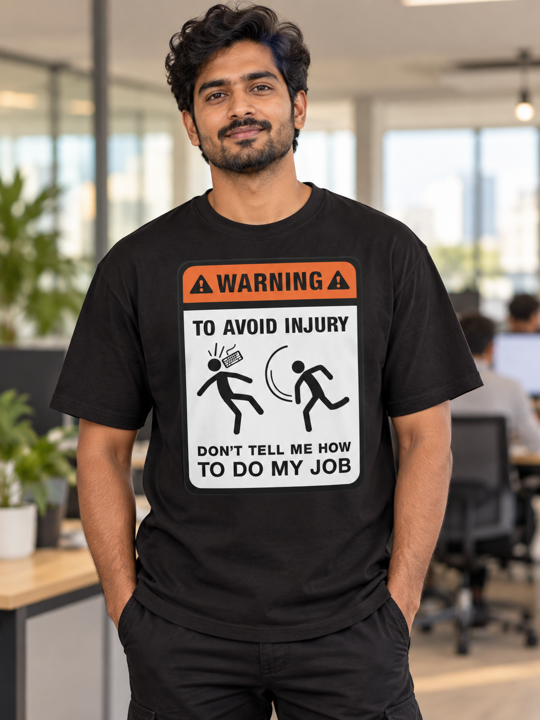 Male model wearing Do Not Tell Me How to Do My Job black oversized printed T-shirt