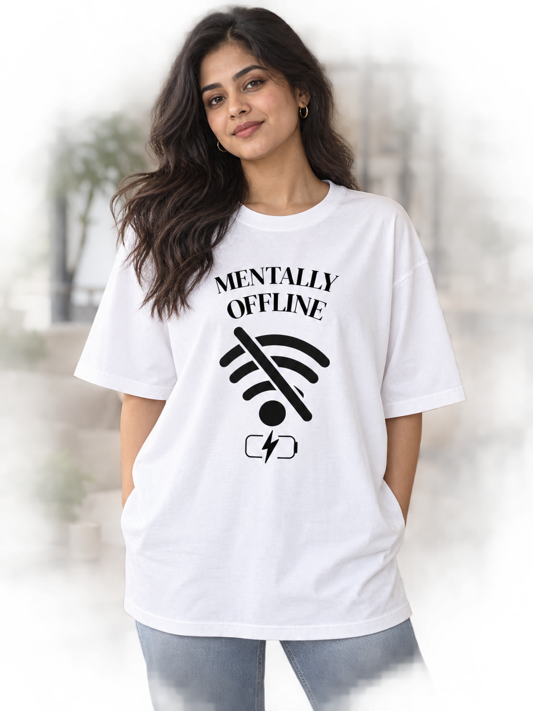 Female model wearing Mentally Offline white oversized printed T-shirt in a corporate lounge